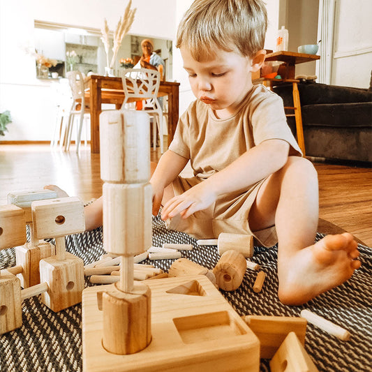 Wooden interlocking blocks on a dark surface