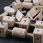 Wooden interlocking blocks on a dark surface