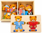 Wooden bear puzzle with interchangeable outfits in a box on a white background