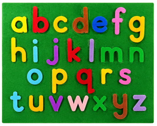 Colorful alphabet letters on a green background