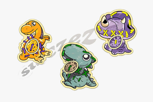 Three cartoon-style dinosaur stickers on a white background