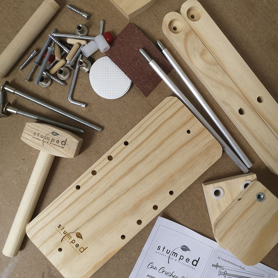 Woodworking tools and materials on a brown surface with 'stumped' branding.
