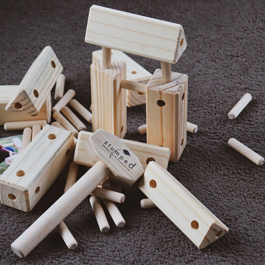 Tri-Knock This wooden building station for toddlers 18 months and up