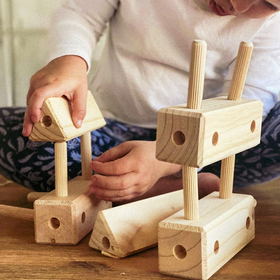 Tri-Knock This wooden building station for toddlers 18 months and up